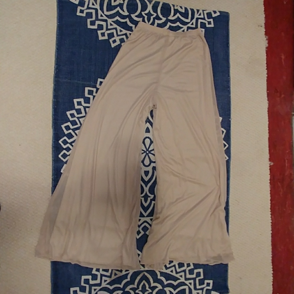 North Style flowing pants with sheer mesh.